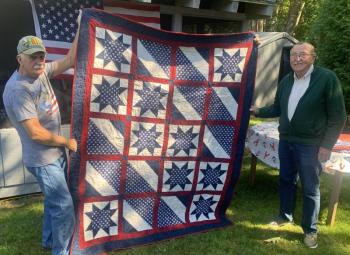 Veteran Dave Patch received a “Quilt of Appreciation” Sept. 17 for his service in the U.S. Navy from 1961 to 1986. BILL PEARSON/Boothbay Register