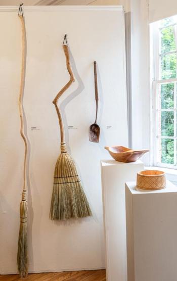 The arrangement of Eric McIntrye's whimsical brooms and delicate bowls made an eye-catching display. Bob Bond photo Eric McIntrye