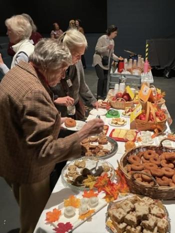 Enjoying food at the annual meeting. Courtesy photo