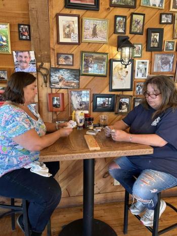 Lisa and Paula playing cribbage. Jen Mitchell photo