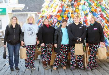 Early Birds gathered ‘round the holiday Pot Buoy Tree on Pier 1 last year. There will be more this year on Saturday, Nov. 18 - maybe even you! File photo