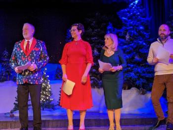 Carolers John Adams, Devin Dukes, Lynne McGhee and Jason Hersom lead the audience through holiday favorites. CANDI JONETH/Boothbay Register