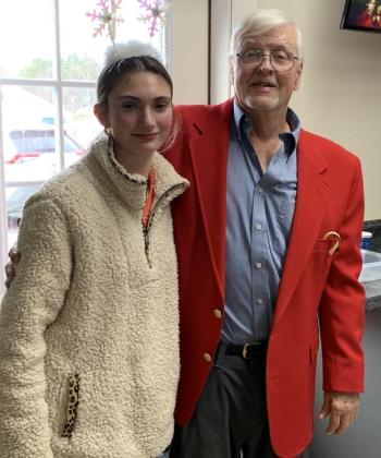 Phil Chapman and his granddaughter Laura Chapman were among two dozen volunteers at the Community Christmas Dinner at the Boothbay American Legion Hall. BILL PEARSON/Boothbay Register