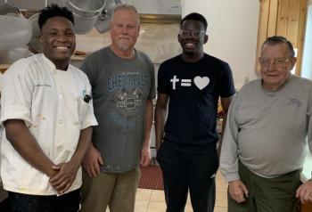 Chef Richardsky Adoux, left, had a plenty of help in the American Legion Hall kitchen Dec. 25 preparing the annual community dinner. Also pictured from right are Arthur Richardson, Karl Joseph and Stan Lewis. BILL PEARSON/Boothbay Register