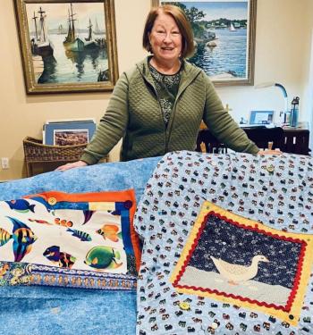 Laura Zajdel created two quilts from St. Andrews Auxiliary Thrift Shop supplies, "Fish Tank" and "Mother Goose." Courtesy photo