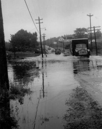 This view looks north on the Meadow. The entrance to present-day Hammond Lumber is on the left. On the right is the house at the beginning of Hackmatack Road. Many sections of the Meadow were still often flooded when I was a young driver in the 1960s. I’m unsure of the date of the photo but it may be 1940s or early 1950s. Courtesy of BRHS