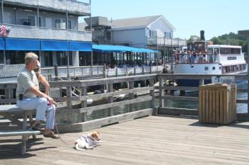 Relaxing at Waterfront Park on Commercial Street, Boothbay Harbor is a favorite thing to do. File photo
