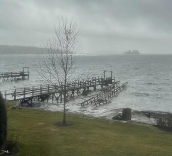 Chris Flower’s photo of pier that washed up next to his, with the dinghy still on it. Blake’s pulled the drifting pier back to the yard. Courtesy of Amy Goodwin, Blake's Boatyard