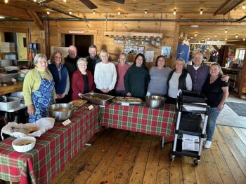 Brady’s volunteers and one of the many host groups at Community Lunch at Brady’s. Courtesy photo