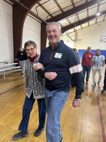 Long-time front desk staff Pat Fraker and aquatics volunteer Rob Wheeler after a session in the gym. Courtesy of BRYMCA