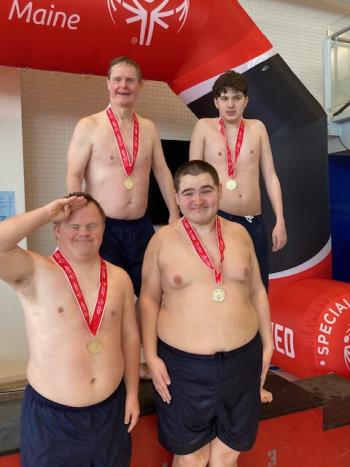 A gold medal-winning relay team. From left,back row: Peter Brewster and Anthony Angelico; front: Danny Miller and Vincent Giles. Courtesy of Toby LeConte