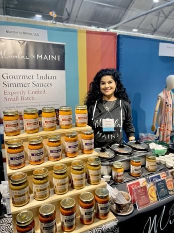 Cherie Scott at her booth at the 40th annual New England Made Giftware & Specialty Food Show. Courtesy of Cherie Scott