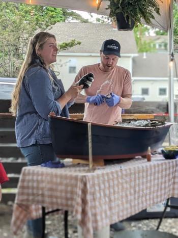 Partygoers enjoyed free oysters. CANDI JONETH/Boothbay Register