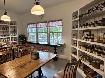 The “back room” at Southport General Store, where you can sit in the window and work while sipping a espresso and enjoying a fresh-baked croissant. JENNY BENNETT/Boothbay Register