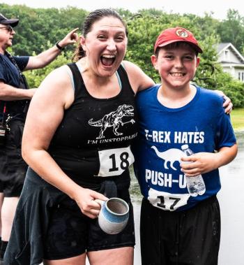 Ellen Verge, left, and son Jacob, 11, smile after opening a prize bag that included locally made pottery after finishing the Edgecomb 250th Birthday Road Race on June 22. Jacob placed third in the 5K leg of the race. Bisi Cameron Yee photo