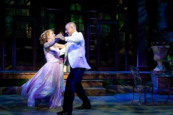 Carolyn Anne Miller (Nellie Forbush) and William Michals (Emile De Becque) in a romantic scene from MSMT’s production of “South Pacific.” Courtesy of MSMT