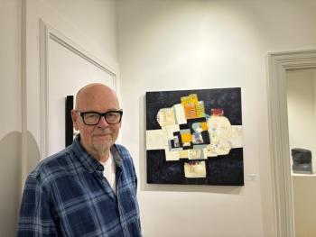 JAAP EDUARD HELDER near one of his abstract paintings at Studio 53 recently. LISA KRISTOFF/Boothbay Register JAAP EDUARD HELDER