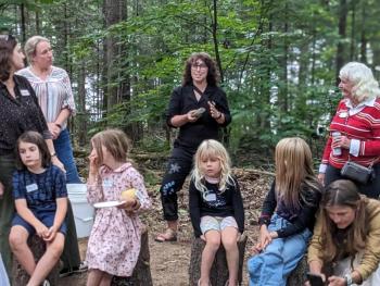 Jess Donohoe, deputy director of Hearty Roots, speaks during “First Fire.” CANDI JONETH/Boothbay Register Event