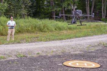 Local surveyor Nicholas Plumer operates a drone with a LiDAR system during a land survey. FRITZ FREUDENBERGER/Boothbay Register