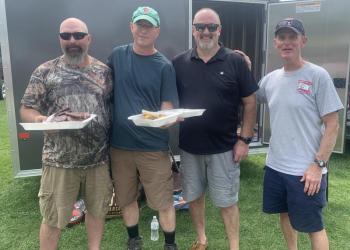 A crew of volunteers made the Aug. 17 V.E.T.S. Inc. barbecue fundraiser a success. Pictured, from left, Ed Harmon Jr., Nathan Harmon, Brad Drummond and Chris Goodwin. BILL PEARSON/Boothbay Register