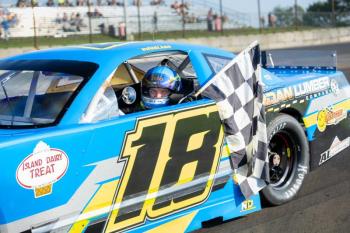 Kevin Douglass celebrates another victory in the Norm's Used Cars Pro Stocks. Jasen Dickey Photography