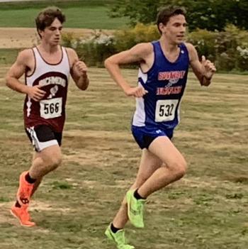 AJ Crocker, right, won the boys race. BILL PEARSON/Boothbay Register A boy runner.
