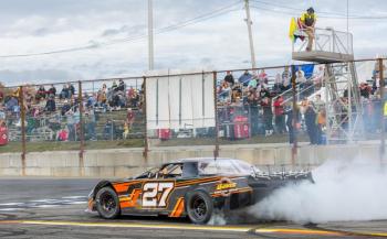 Bubba Pelton does a burnout on the front stretch after winning the feature race and the Super Street championship. Jasen Dickey Photography Bubba Pelton does a burnout on the front stretch after winning the feature race and the Super Street championship. Jasen Dickey Photography