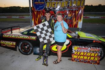 Tiger Colby celebrates 3-in-a-row with his Mom, Casey. Courtesy of David Montgomery/Mainemonty Media