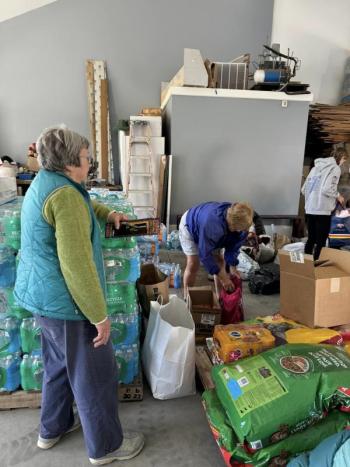 Volunteers get items ready to load into a truck bound for North Carolina to help hurricane victims. Courtesy of Jen Mitchell Packing up