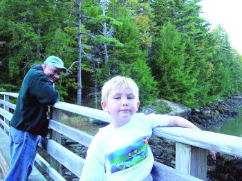 Allison took this photo of Jeff and their son years ago during a hike along a trail at Boothbay Region Land Trust's Oven's Mouth Preserve. Courtesy of Allison Wells Oven's Mouth Preserve trail