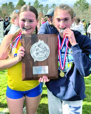 Two runners celebrate. 