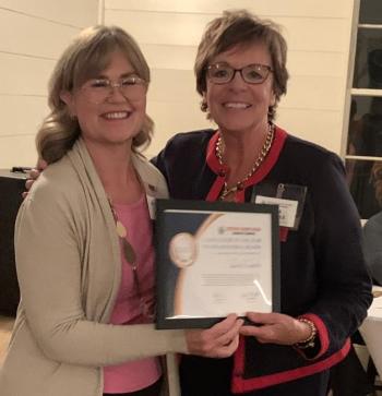 Lisa Clarke, right, received the Educator of the Year Award. Also pictured, Julie Roberts. BILL PEARSON/Boothbay Register Clarke