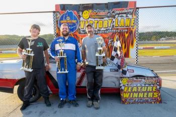 Roadrunner podium, from left: Alec Brown, Kyle Enman (champion) and first-time race winner Ken Turner. Jasen Dickey Photography On the podium