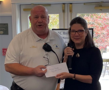 Dan Gardner, Boothbay Region Ambulance Service, accepted a check in the amount of $5,000. Courtesy photo Dan