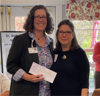 Reven Oliver, MaineHealth Lincoln Hospital Director of Philanthropy, accepted a check in the amount of $39,500 for an Xray machine for St. Andrews Urgent Care, EKG machine for St. Andrews Family Care Center, gifts for St. Andrews Village Gregory Wing- Safe Havens residents, and School Based Health Center at Boothbay Region High School. Courtesy photo Reven
