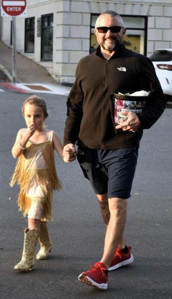 Halloween parade participants.