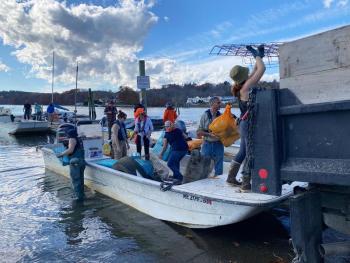 Clean-up volunteers unload trash collected from along the shoreline of the Damariscotta River on Nov. 1. Courtesy of Coastal Rivers