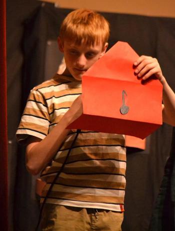 Duncan Scott does one of the readings. KEVIN BURNHAM/Boothbay Register