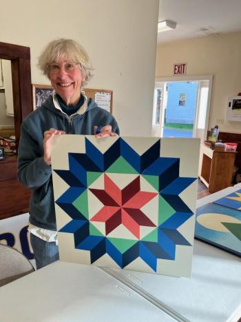 Southport artist Fran Scannell and her star square completed at the Oct. 26 quilt workshop with Saskia Reinholt. . Courtesy photo Southport artist Fran Scannell and her star square completed at the Oct. 26 quilt workshop with Saskia Reinholt. Courtesy photo