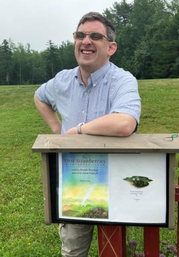 Matt Brough with one of the Story Walk Houses Mobius built and installed at Medomak Valley High School.