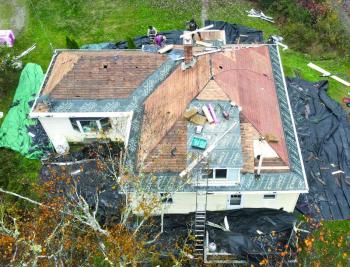 Roof work on a Southport home. Courtesy of Jack Herger