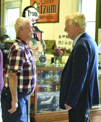 Sen. Angus King talks with George McEvoy, founder of the Boothbbay Railway Village Museum, during a celebration gathering for the Museum's 60th anniversary. File photo