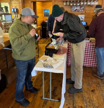 Jose Rivera and Scott Edwards try samples and vote for People's Choice. Jen Mitchell photo Jose Rivera and Scott Edwards try samples and vote for People's Choice. Jen Mitchell photo