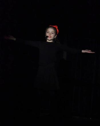 Iris Adams opens the show with an endearing performance of "Where Are You, Christmas?"   