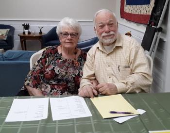 Sue Burge and Larz Neilson greet and keep count of diners. JANE CARPENTER/Boothbay Register Sue Burge and Larz Neilson