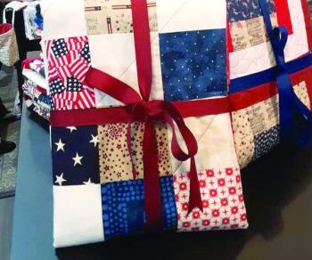 Red, white and blue quilts made by Southport Island quilters. JANE CARPENTER/Boothbay Register Red, white and blue quilts made by Southport Island quilters. JANE CARPENTER/Boothbay Register