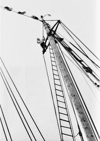 A crew member high up in the rigging of the Bowdoin's rear mast. PHIL DI VECE photo A crew member high up in the rigging of the Bowdoin's rear mast. PHIL DI VECE photo