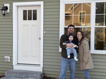 Hunter and Hayley Arsenault with son Calder at their new home in Boothbay Harbor. Courtesy of Hunter and Haley Arsenault