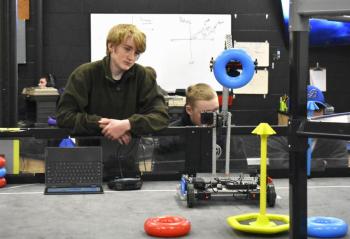 Jayden Orne test runs his team's robot on the practice field. ISABELLE CURTIS/Boothbay Register