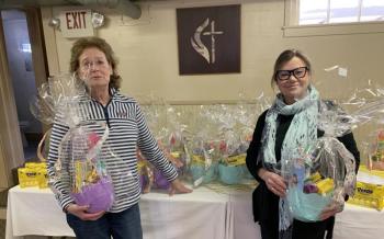 An East Boothbay United Methodist Church project provided 20 Easter baskets, delivered to the Community Fridge by Sarah Giles, left, and Laurie Glasrud, who assembled the baskets with Deb Moorefield. File photo